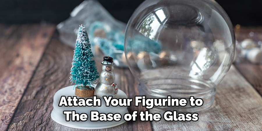 Attach Your Figurine to
The Base of the Glass