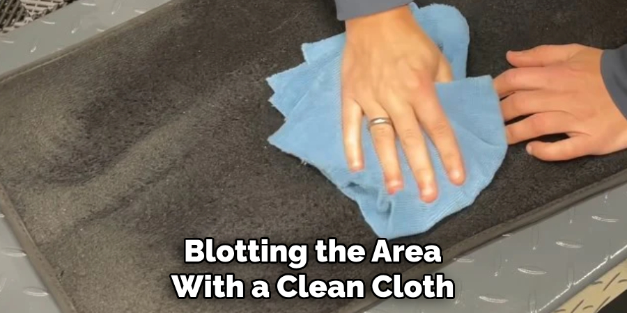 Blotting the Area
With a Clean Cloth