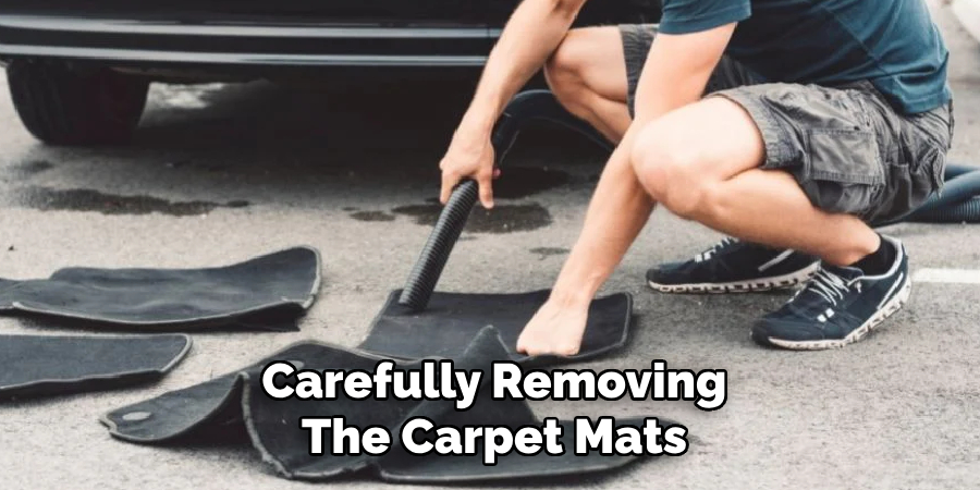 Carefully Removing
The Carpet Mats