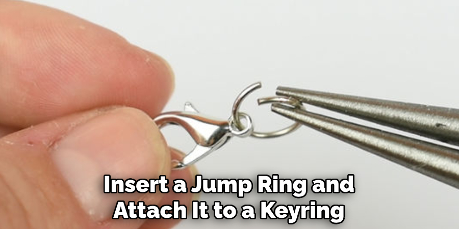 Insert a Jump Ring and
Attach It to a Keyring